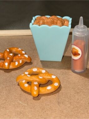 Our generation snacks tub of peanuts 2 pretzels and condiment